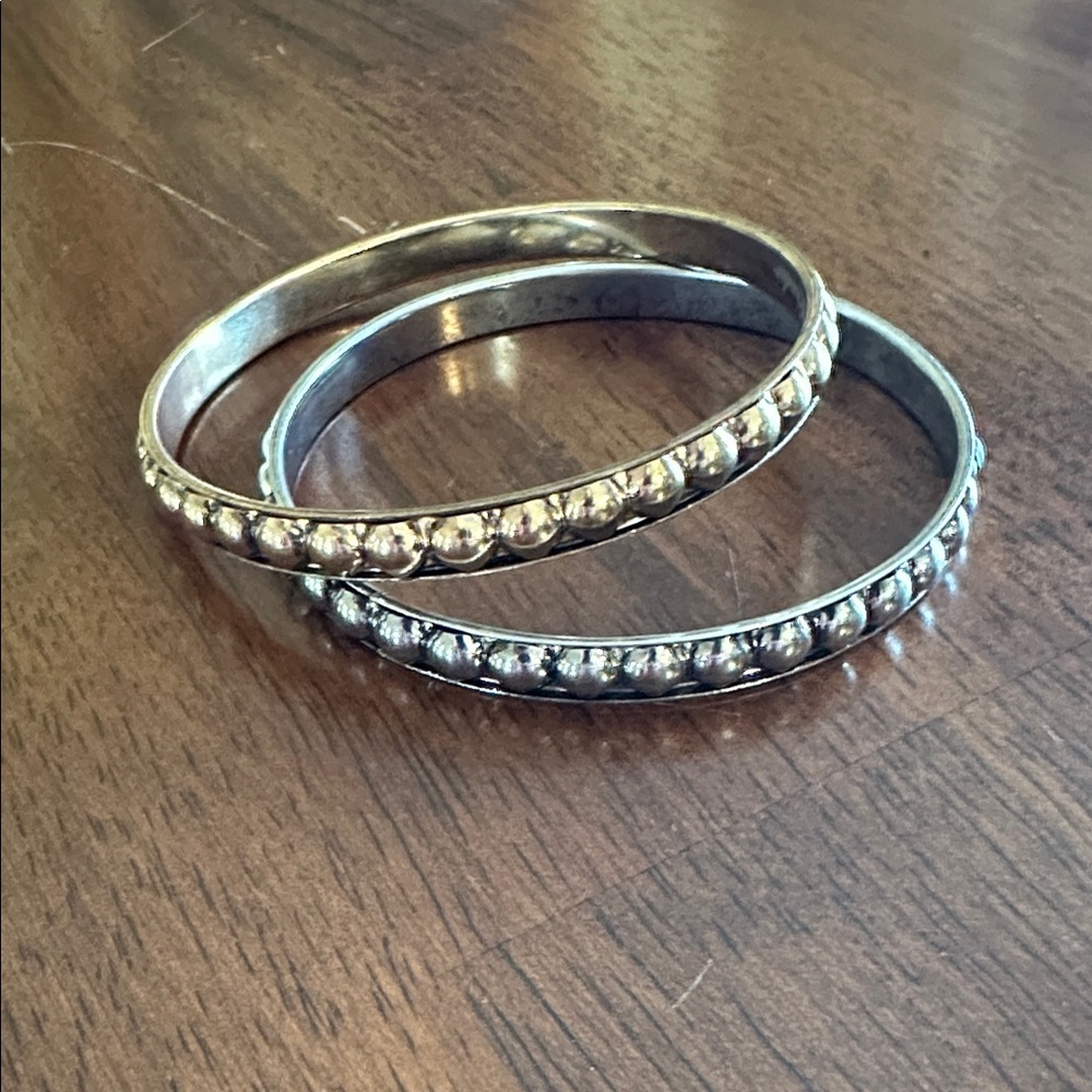 PLUNDER SILVER AND GOLD TONE BANGLE BRACELETS SET OF TWO